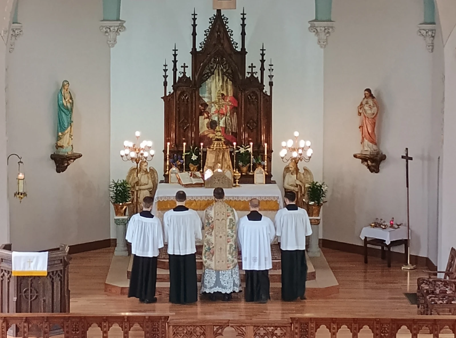 The restored altar of St. Charles Borromeo at Easter in 2025